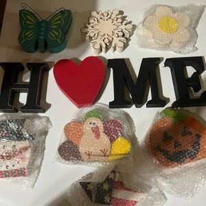 Assorted holiday HOME sign decor